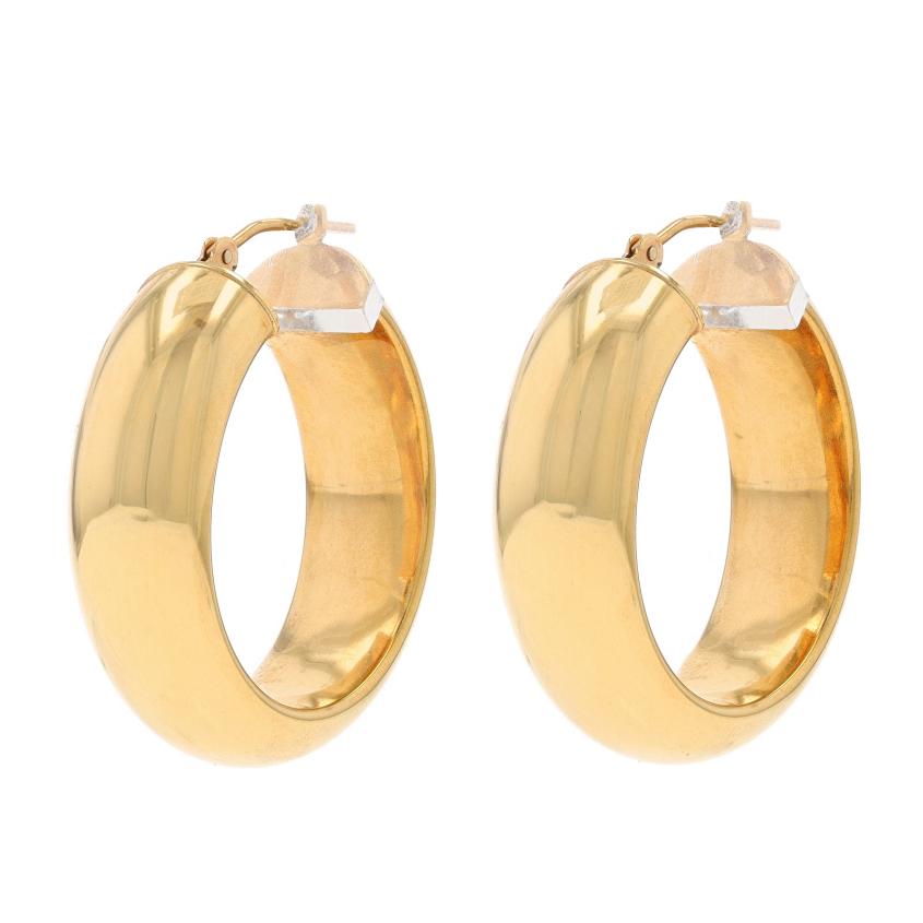 Metal Content: 14k Yellow Gold

Style: Hoop
Fastening Type: Snap Closures
Features: Hollow construction for comfortable, all-day wear

Measurements

Tall: 1