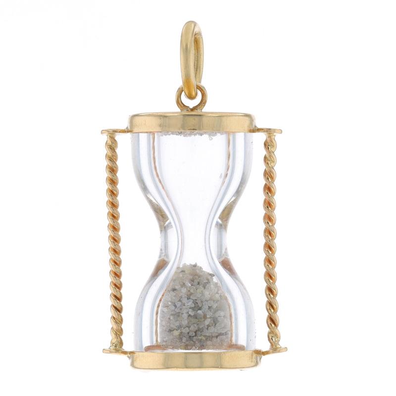Metal Content: 14k Yellow Gold

Material Information
Glass & Sand

Theme: Hourglass, Timekeeping
Features: When flipped, the sand moves through the hourglass.

Measurements
Tall (from stationary bail): 29/32