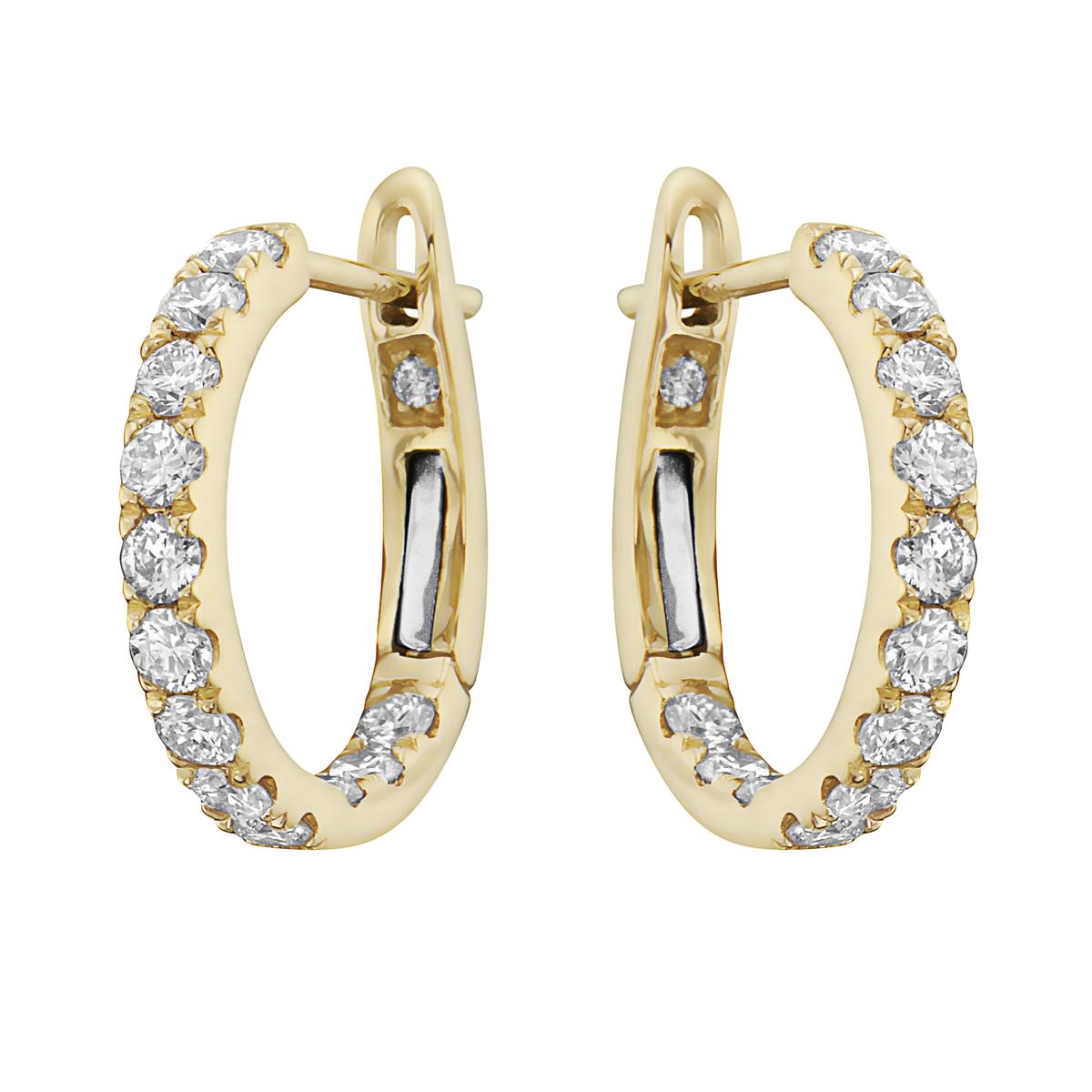 With these exquisite diamond earrings, style and glamour are in the spotlight. These yellow gold hoop earrings are set in 14-karat gold and made from 2.4 grams of gold. The color of the diamonds is GH. The clarity is SI1. This piece is made out of