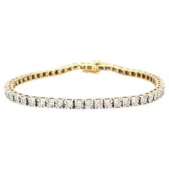 Illusion Set Diamond Tennis Bracelet Yellow Gold