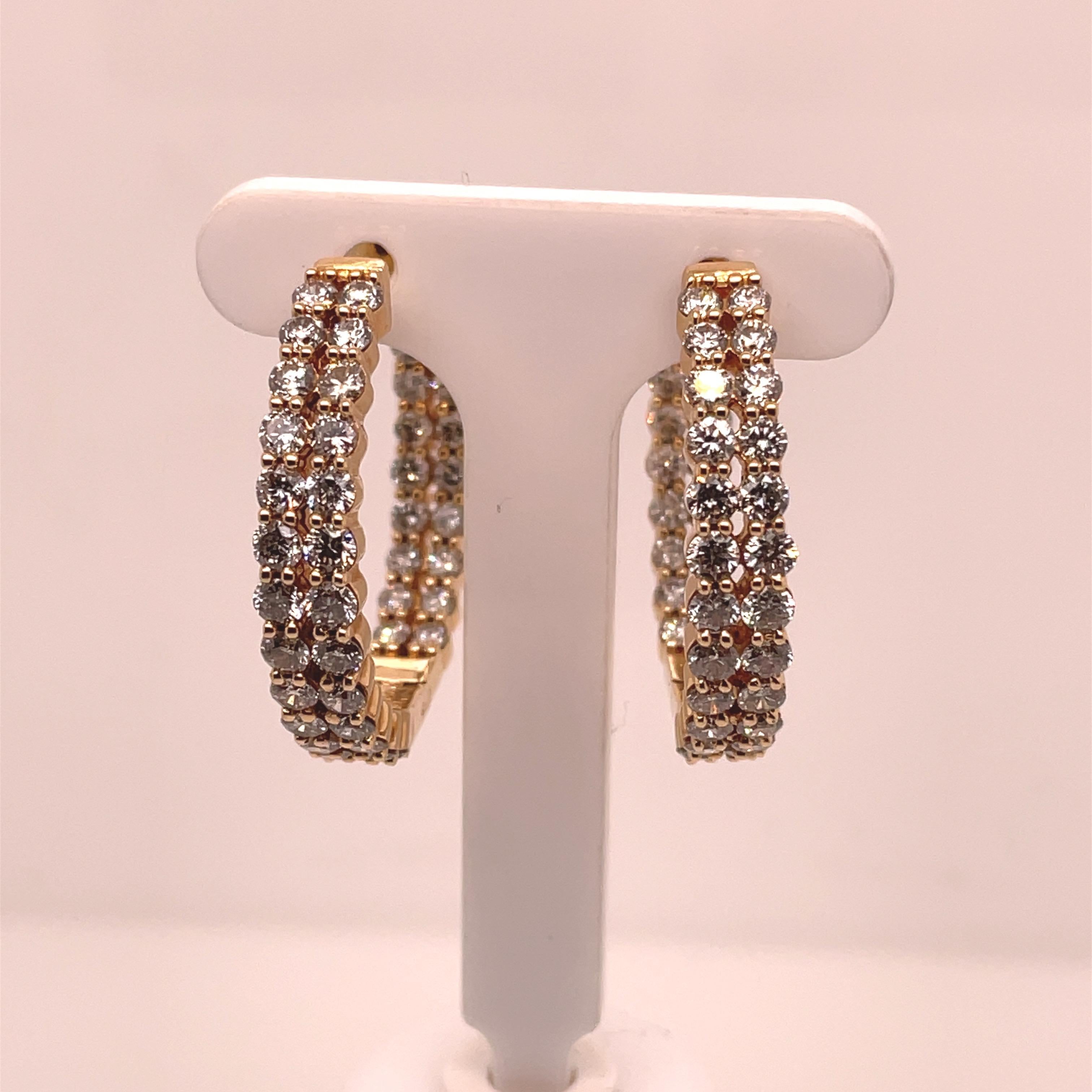 Four Carats of Diamonds in these gorgeous double row yellow gold hoops.  14K yellow gold.