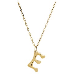 Pendentif initial en or jaune
