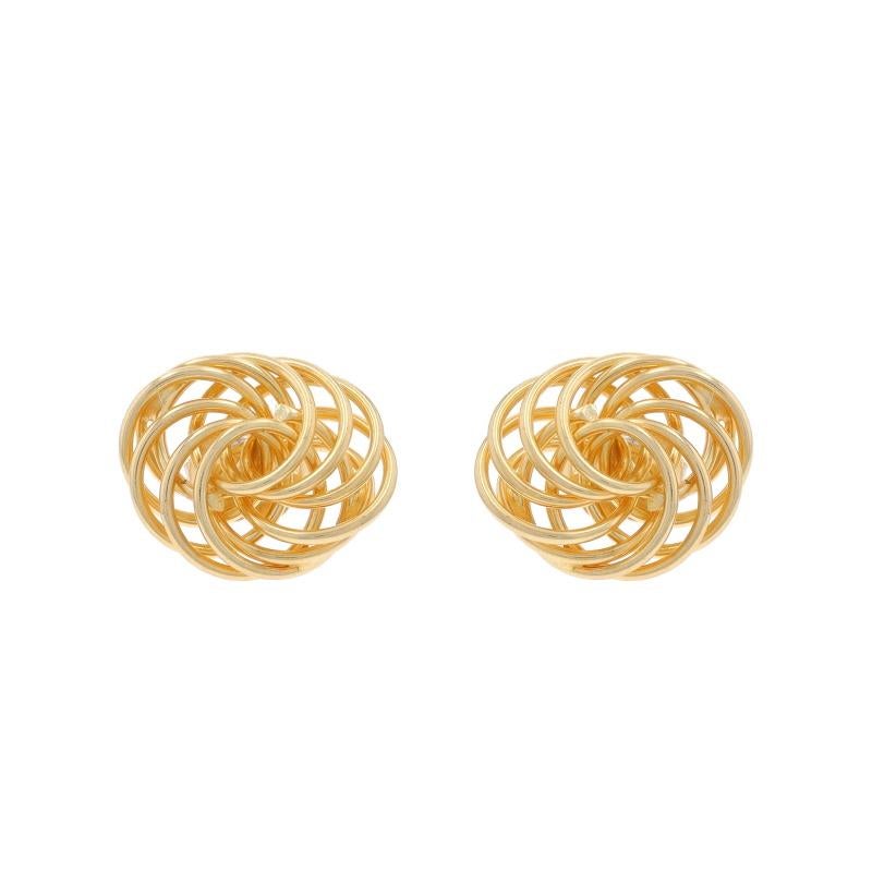Metal Content: 14k Yellow Gold

Style: Stud
Fastening Type: Butterfly Closures
Theme: Intertwined Circles

Measurements

Tall: 15/32