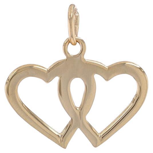 Yellow Gold Intertwined Hearts Charm - 14k Love Silhouette Pendant For Sale