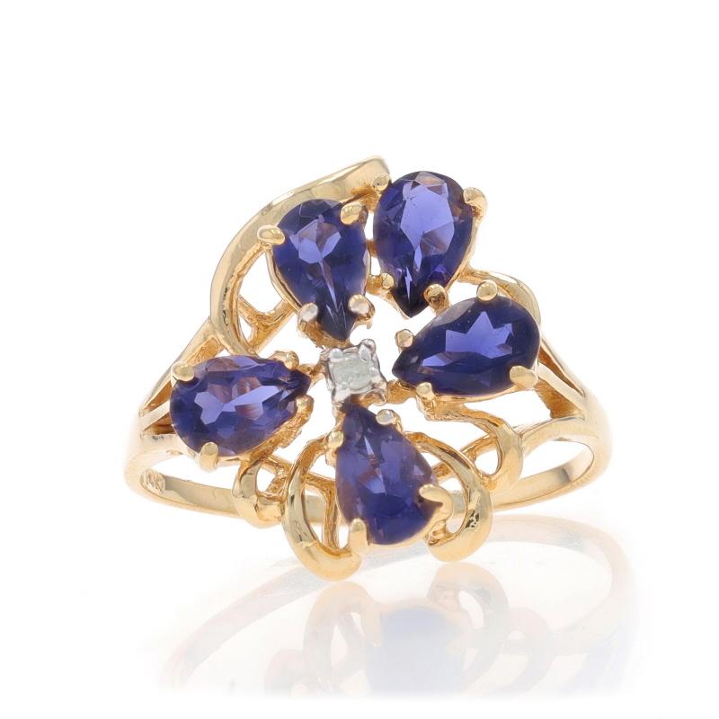 Size: 9 1/4
Sizing Fee: Up 3 sizes for $35 or Down 2 sizes for $35

Metal Content: 14k Yellow Gold & 14k White Gold

Stone Information

Natural Iolites
Carat(s): 1.25ctw
Cut: Pear
Color: Purple

Natural Diamond
Carat(s): .01ct
Cut: Round