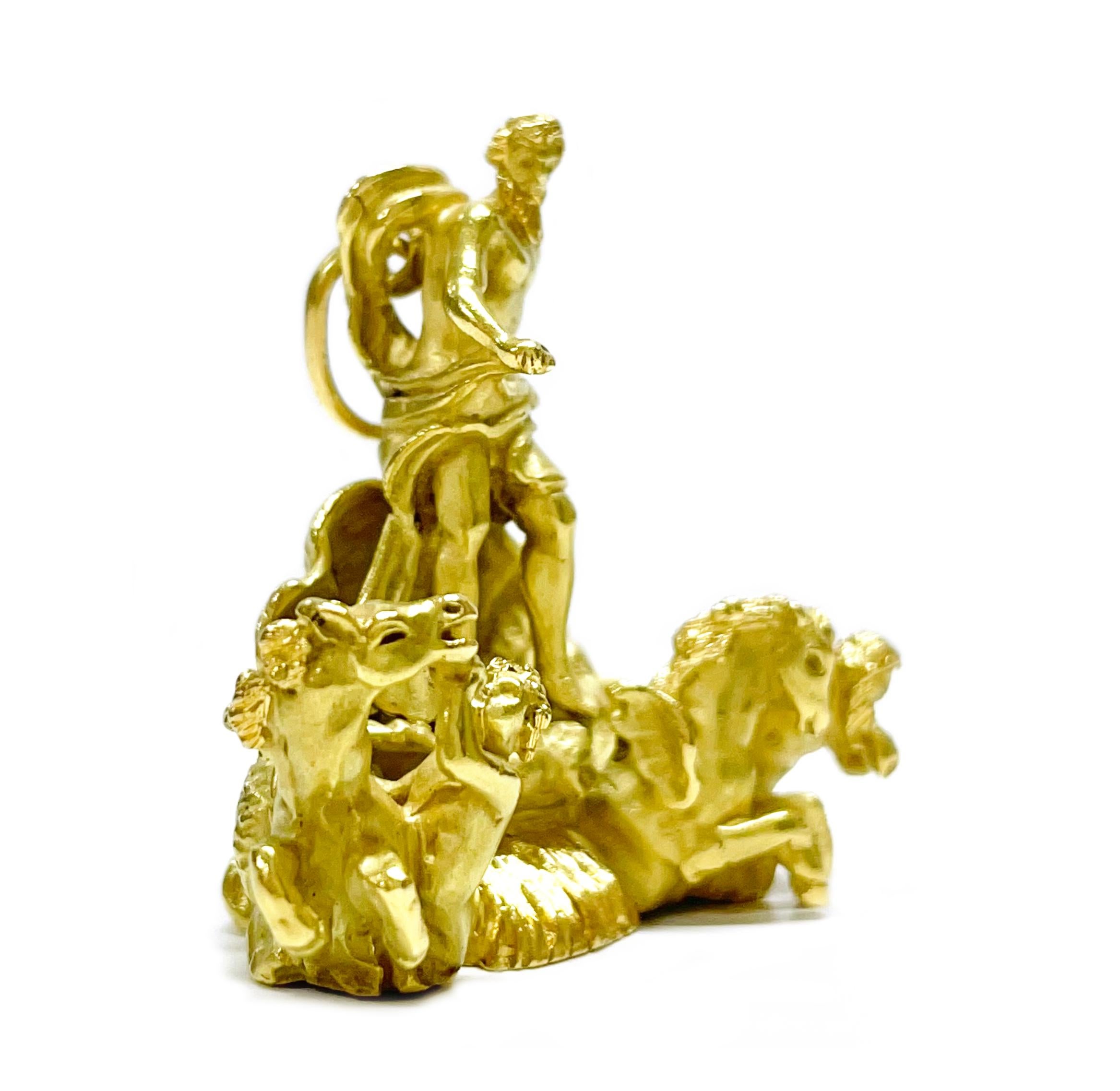 18 Karat Yellow Gold Italian Trevi Fountain Pendant. The pendant features Oceanus, the Greek Titan of the oceans, and a seahorse and triton at each side. The pendant measures 32 tall x 31mm wide. This pendant weighs 29.3 grams.

OKEANOS (Oceanus)