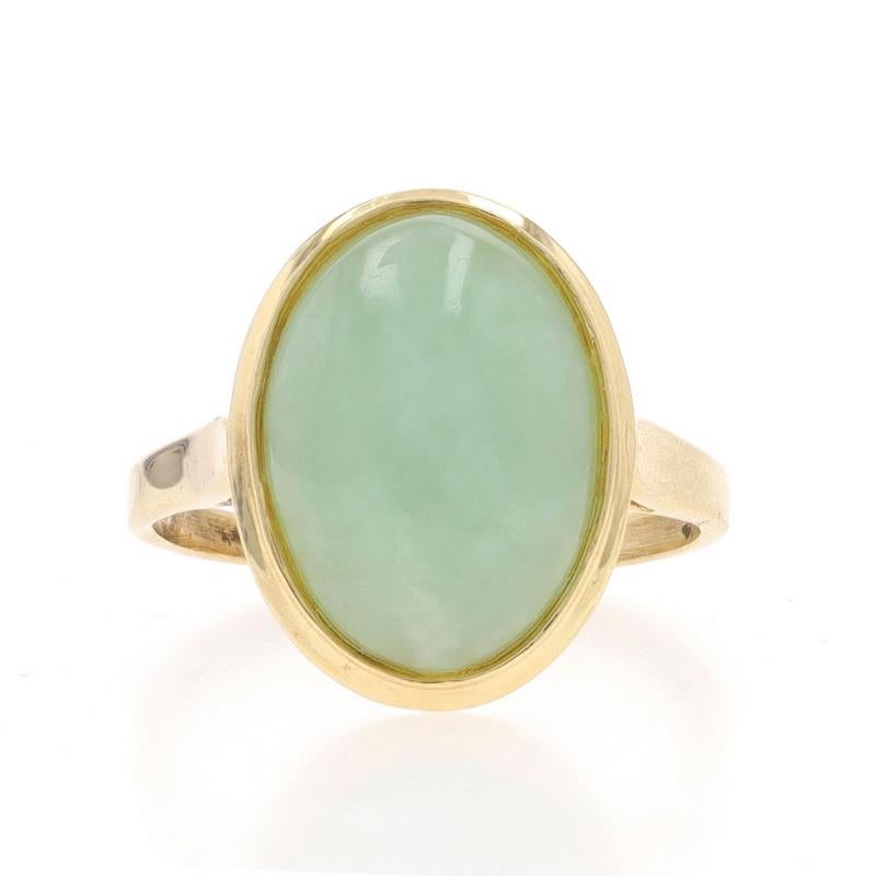 Size: 6 1/4
Sizing Fee: Up 2 sizes for $30 or Down 1 size for $30

Metal Content: 14k Yellow Gold

Stone Information

Natural Jadeite
Treatment: Routinely Enhanced
Cut: Oval Cabochon
Color: Green

Style: Cocktail Solitaire

Measurements

Face Height