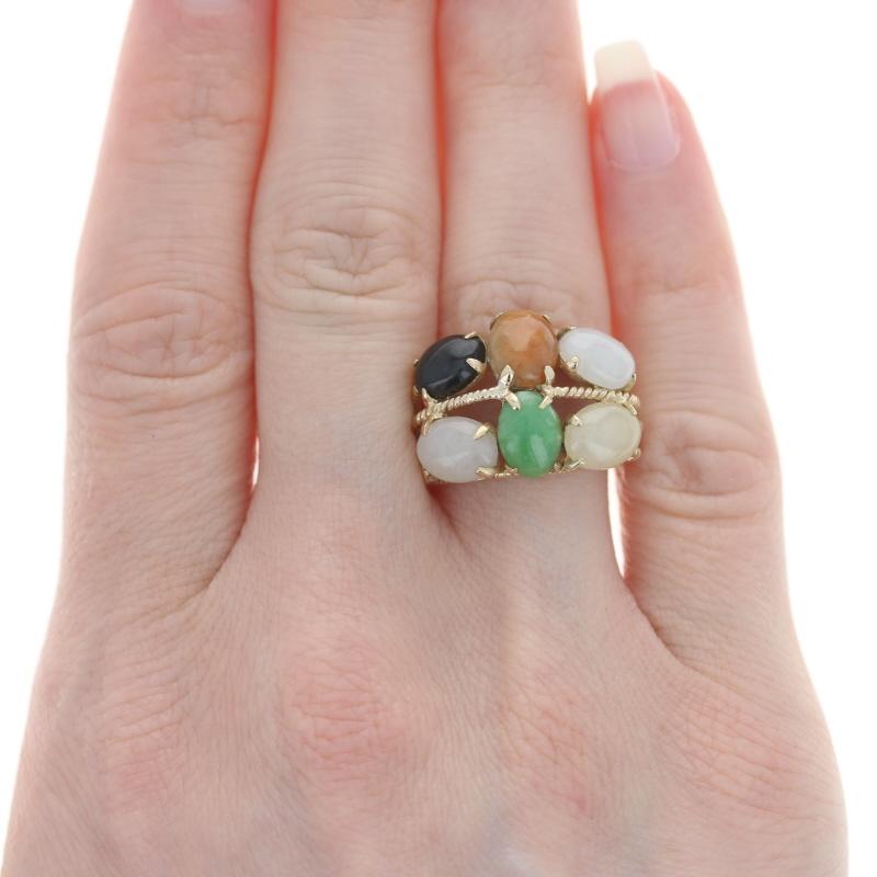 Size: 6 3/4

Metal Content: 14k Yellow Gold

Stone Information
Genuine Jadeite
Treatment: Routinely Enhanced
Cut: Oval Cabochon
Colors: Orange, Green, White, Pale Purple, & Pale Yellow

Genuine Onyx
Cut: Oval Cabochon
Color: Black

Style: Cluster