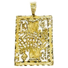 Pendentif en or jaune orné d'un roi de diamants représentant une carte à jouer