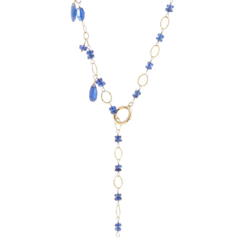 Metal Content: 14k Yellow Gold

Stone Information

Natural Kyanites
Color: Blue

Natural Lapis Lazuli
Color: Blue

Style: Fancy Chain Lariat
Fastening Type: Pull-Through Toggle

Measurements

Adjustable length up to: 31 1/2