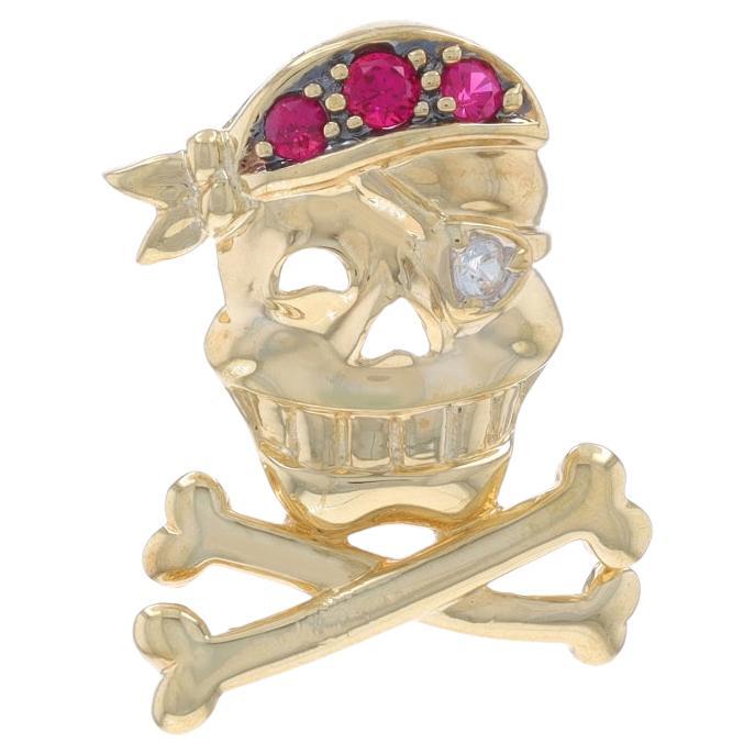 Yellow Gold Lab Created Ruby Sapphire Jolly Roger Pendant - 10k Round .13ctw For Sale