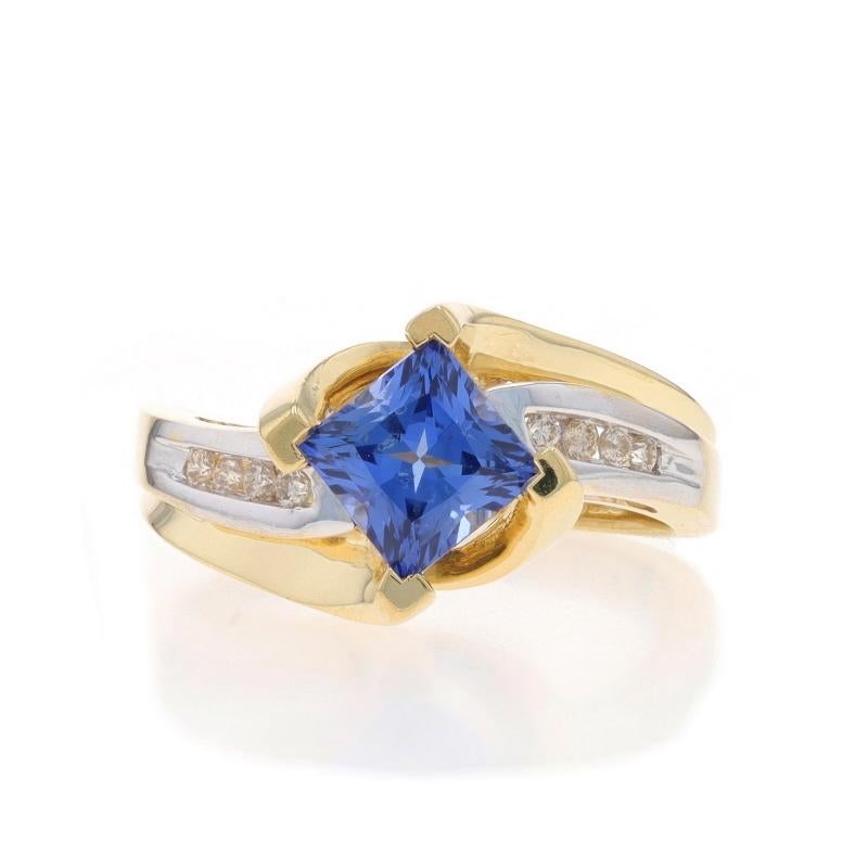 Size: 7 1/4
Sizing Fee: Up 1 size for $30 or Down 1/2 a size for $30

Metal Content: 10k Yellow Gold & 10k White Gold

Stone Information

Synthetic Sapphire
Carat(s): 1.43ct
Cut: Princess
Color: Blue

Natural Diamonds
Carat(s): .08ctw
Cut: Round