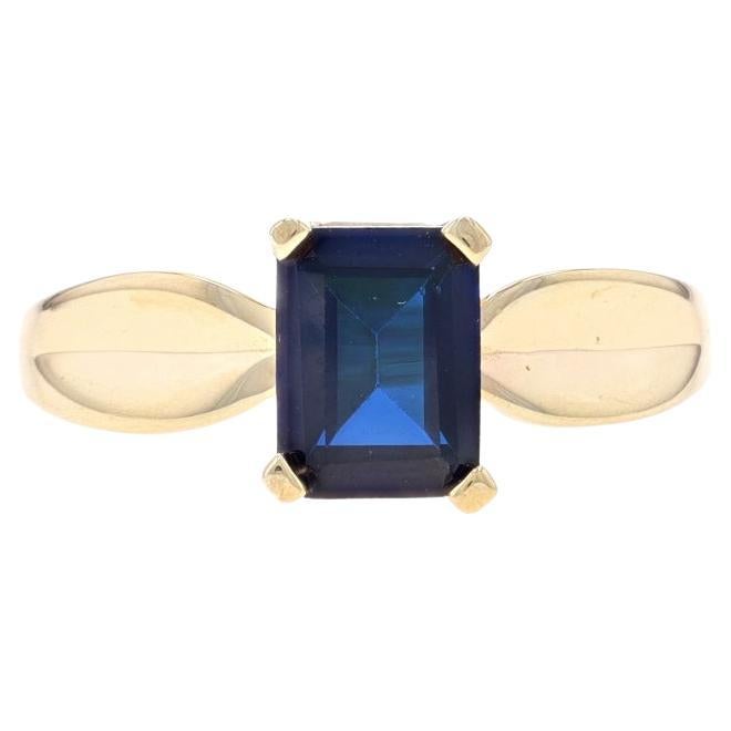Yellow Gold Lab-Created Sapphire Solitaire Ring - 10k Emerald Cut 1.75ct
