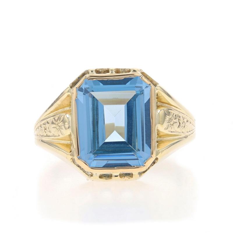 Size: 6 1/2

Era: Vintage
Date: 1950s - 1960s

Metal Content: 10k Yellow Gold

Stone Information
Synthetic Spinel
Carat(s): 10.45ct
Cut: Rectangular Step
Color: Blue

Total Carats: 10.45ct

Style: Cocktail Solitaire

Measurements
Face Height (north
