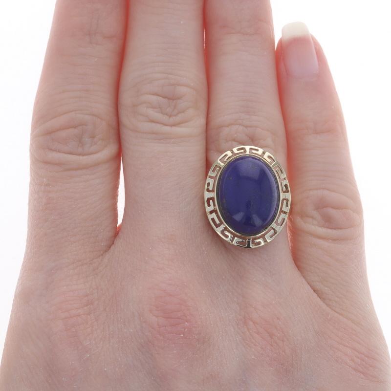 Size: 6 1/4
Sizing Fee: Up 2 sizes for $45 or Down 1 size for $45

Metal Content: 14k Yellow Gold

Stone Information
Natural Lapis Lazuli
Cut: Oval Cabochon
Color: Blue

Style: Cocktail Solitaire
Features: Open Cut Greek Key Border & Split