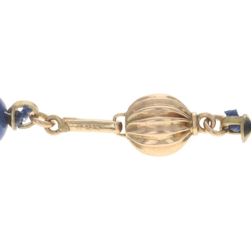 Collana in oro giallo con fili annodati di lapislazzuli da 28