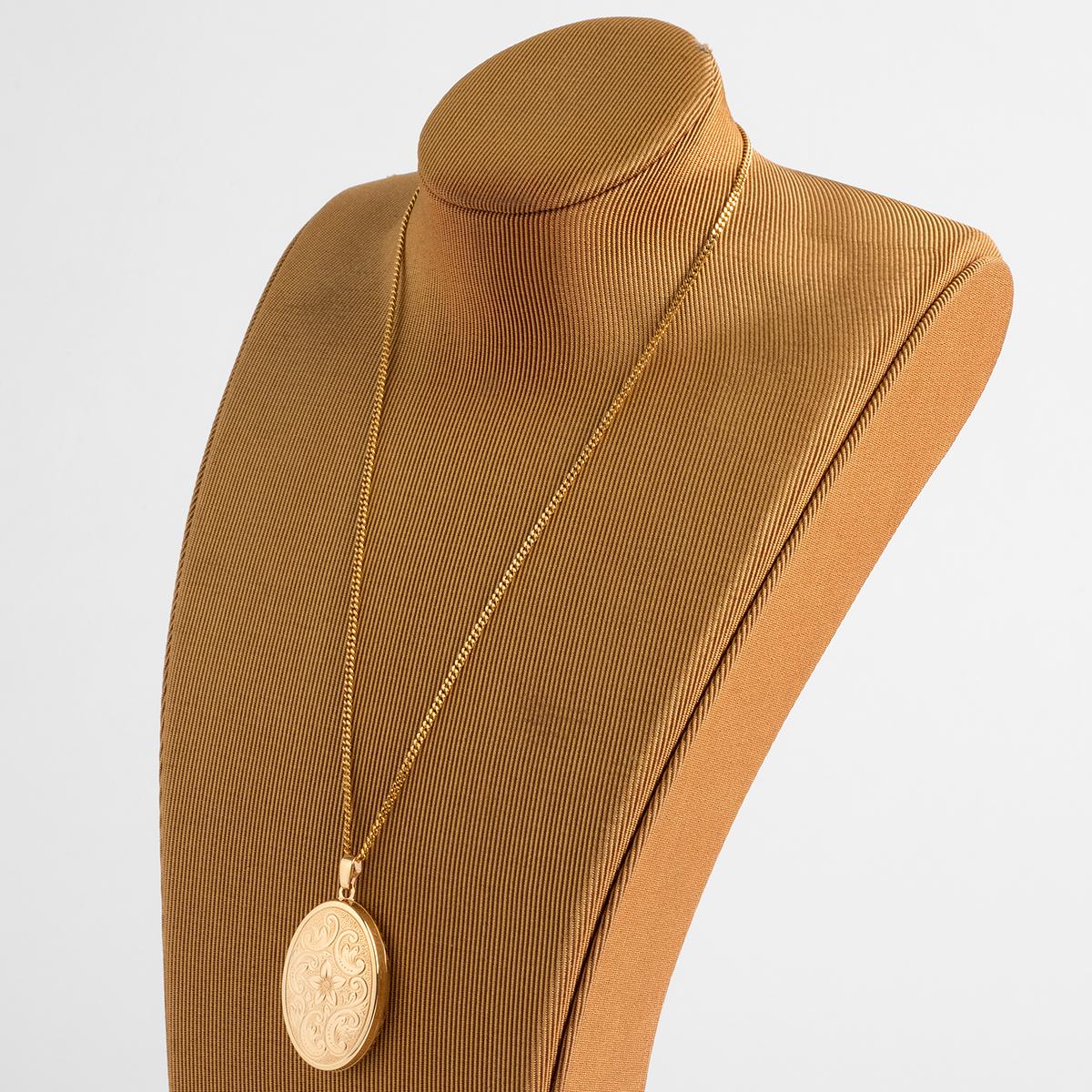 A unique piece within our carefully curated Vintage & Prestige fine jewellery collection, we are delighted to present the following:

This classic and generous engraved 9K yellow gold locket measures 20mm x 30mm and comes with a yellow gold chain