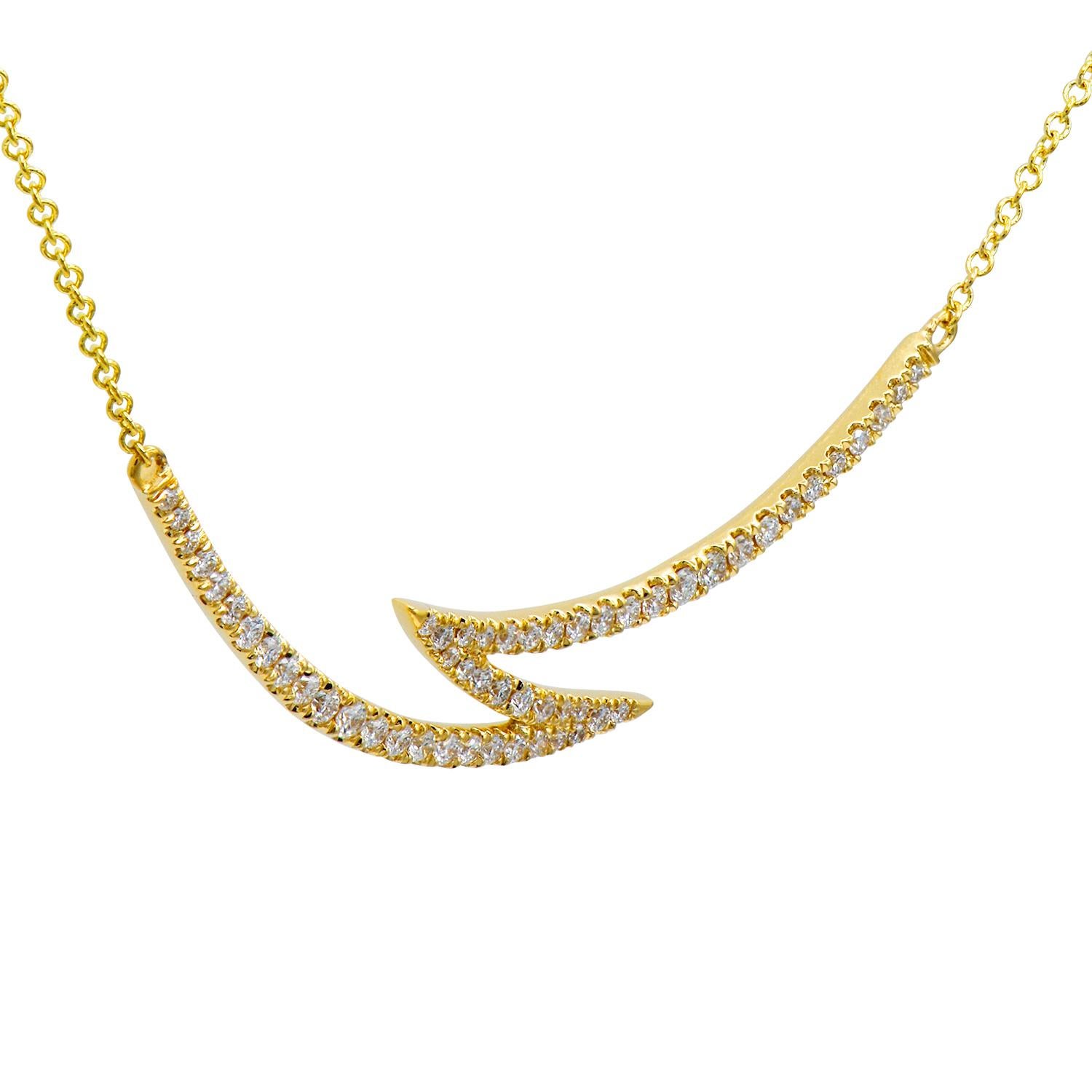 This yellow gold necklace looks like a curved bolt of lightning and is sure to brighten someone's day. The lightning bolt is covered with 54 round VS2. G color diamonds totaling 0.33 carats which are set in 2.9 grams of 18 karat yellow gold. This