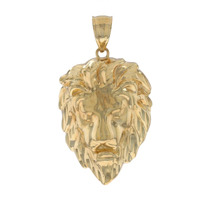 Metal Content: 10k Yellow Gold

Theme: Lion's Head, King of the Jungle
Features: Hollow construction with etched detailing

Measurements
Tall (from stationary bail): 1 1/4