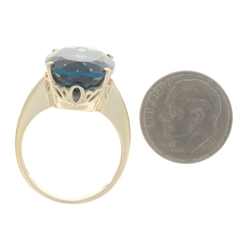 Anillo solitario de oro amarillo Londres con topacio azul de cóctel - 10k Oval 17.10ct en venta 1
