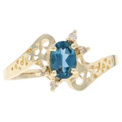 Anello bypass in oro giallo London Blue Topaz Diamond - 10k Oval .54ctw