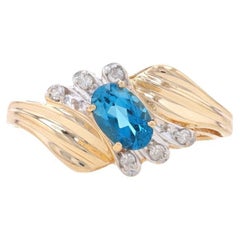 Yellow Gold London Blue Topaz & Diamond Bypass Ring - 14k Oval .76ctw