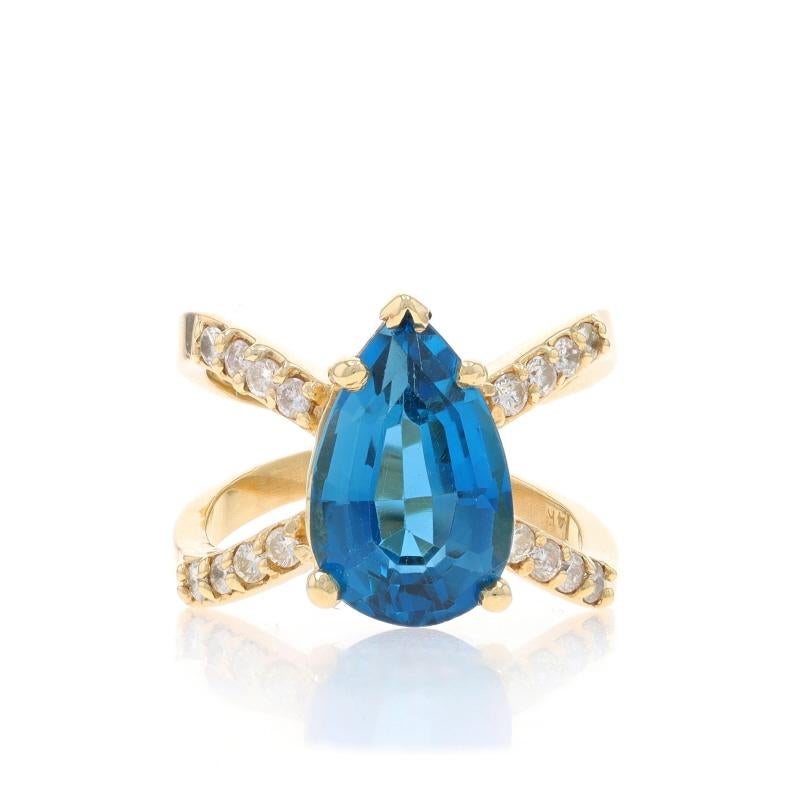 Size: 6 1/2
Sizing Fee: Up 1 1/2 sizes for $40 or Down 1/2 a size for $30

Metal Content: 14k Yellow Gold

Stone Information

Natural Topaz
Treatment: Routinely Enhanced
Carat(s): 4.60ct
Cut: Pear
Color: London Blue

Natural Diamonds
Carat(s):