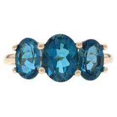 Yellow Gold London Blue Topaz Three-Stone Ring - 14k Oval 4.03ctw
