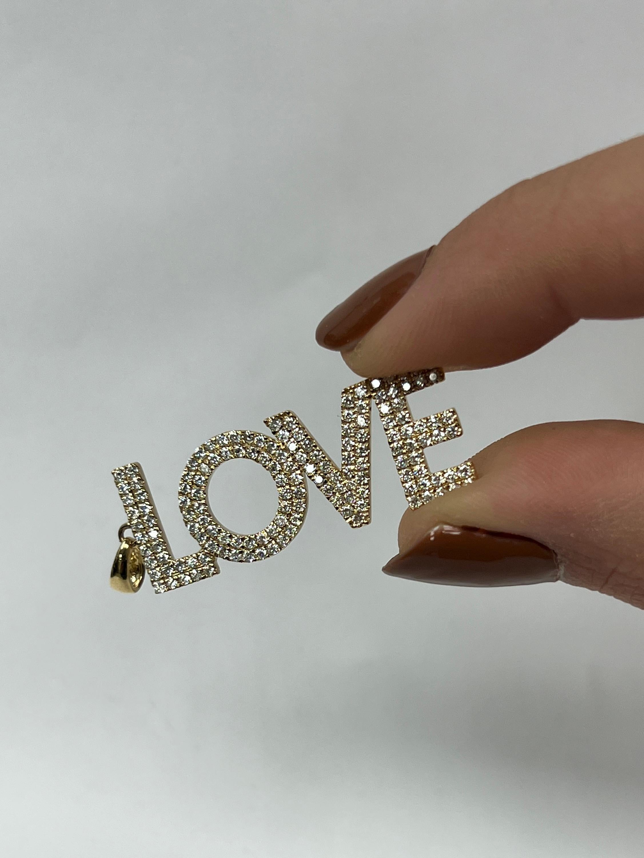 Modern Yellow Gold Love Pendant For Sale