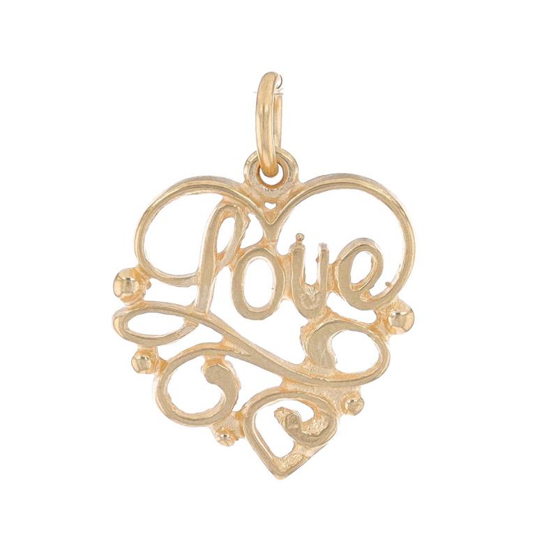 Metal Content: 14k Yellow Gold

Theme: Love Scrollwork Heart, Keepsake
Features: Open Cut Design

Measurements

Tall (from stationary bail): 21/32