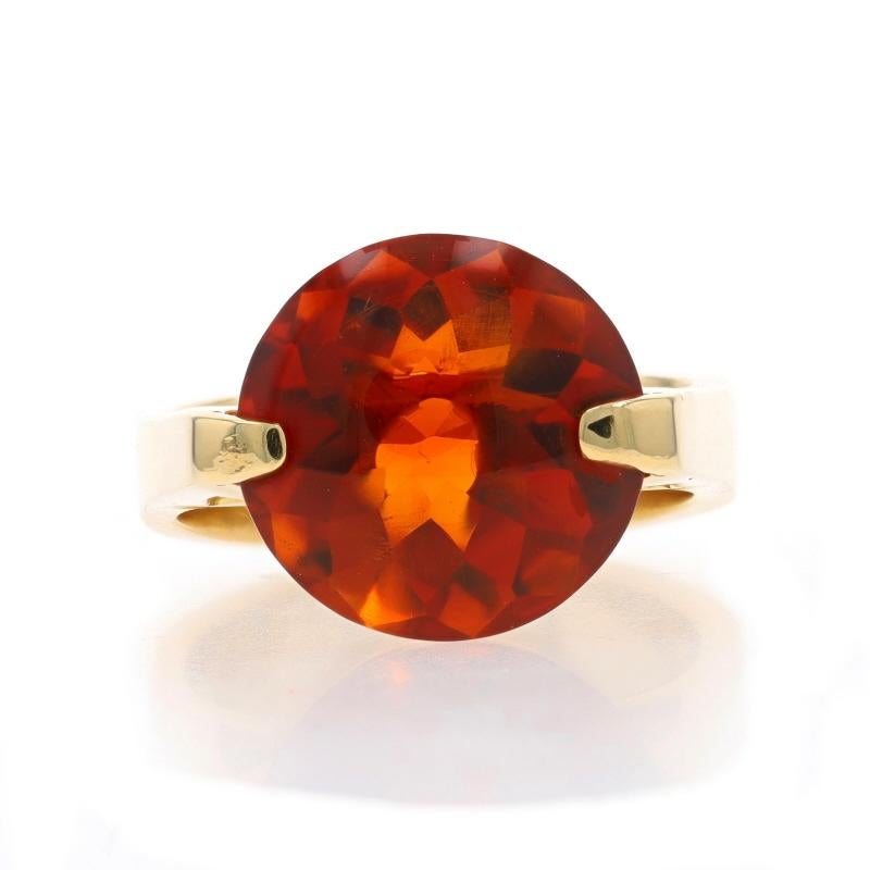 Size: 7 3/4
Sizing Fee: Up 1 size for $80 or Down 1 size for $40

Metal Content: 18k Yellow Gold

Stone Information

Natural Citrine
Treatment: Heating
Carat(s): 8.82ct
Cut: Buff Top Round Portuguese
Color: Maderia

Total Carats: 8.82ct

Style:
