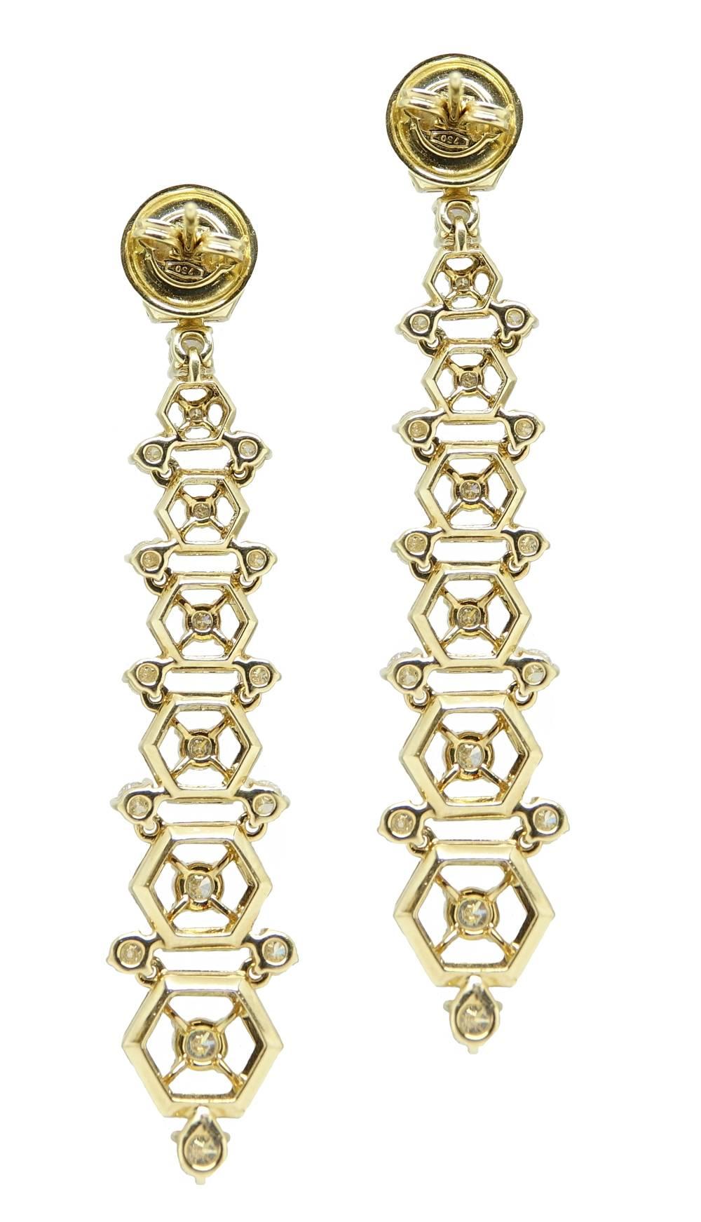 These Elegant 18K Yellow Gold Maria Canale Dangle Earrings Are Beyond Beautiful. 38 Total Round Prong Set Diamonds Adds The Perfect Touch Of Sparkle and Weigh A Total Carat Weight Of 3.10 Carats. These Lovely Earrings Are 2.5 Inches In Length.