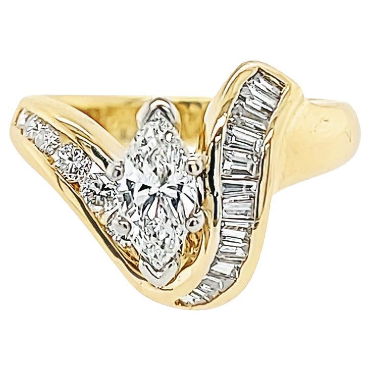 Assymetricer Ring aus Gelbgold mit Marquise- und Baguette-Diamant