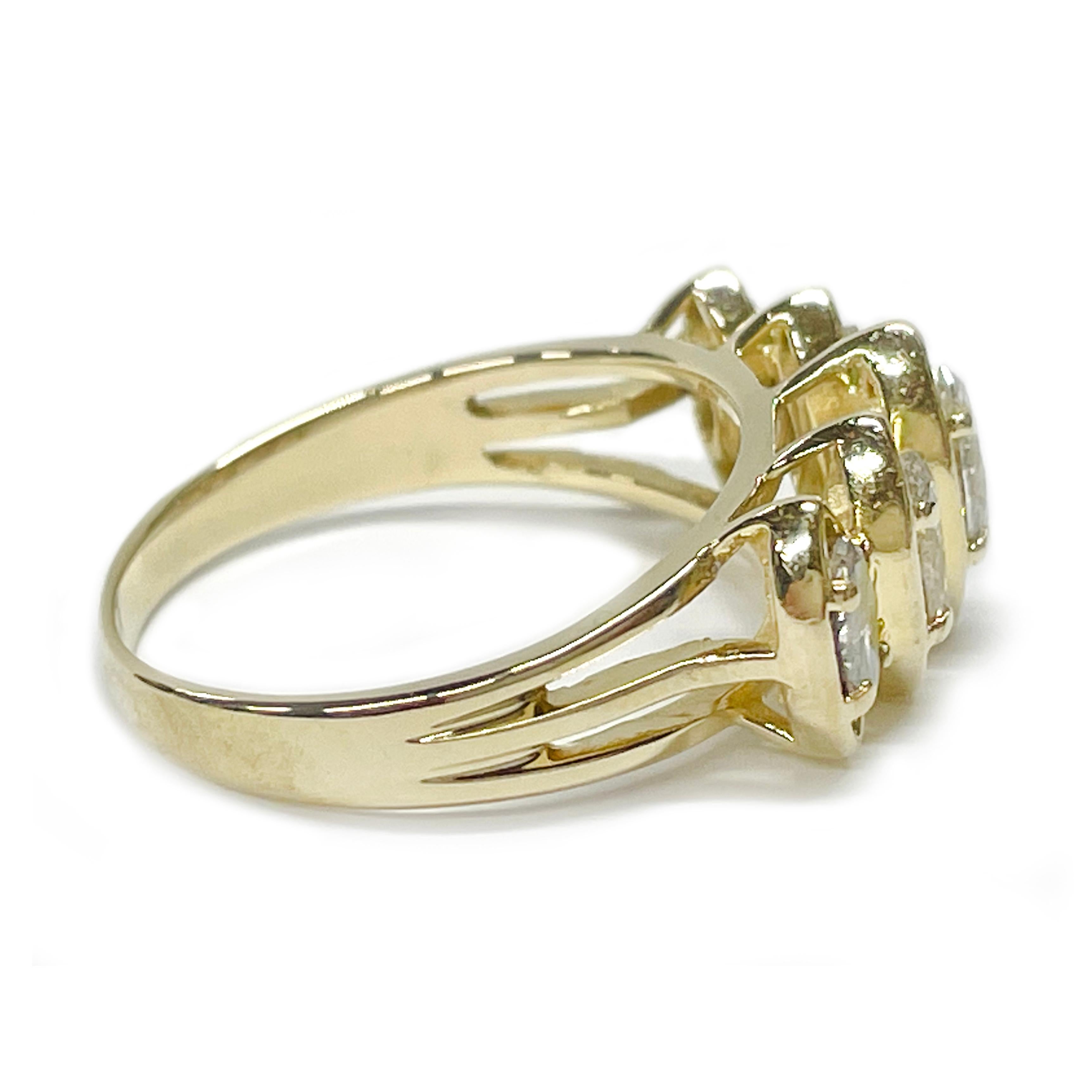 14 Karat Yellow Gold Marquise Diamond Ring. The split band ring features five marquise diamonds set in a marquise shaped open bezel. There is one 6.5 x 3mm (0.33ct), two 5.5 x 3mm (.40ctw) and two 5 x 3mm (0.22ctw). The total carat weight of the