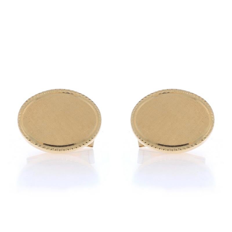Metal Content: 14k Yellow Gold

Style: Cufflinks
Theme: Oval
Features: Hollow Construction with Textured Detailing

Measurements

Face Height (north to south): 21/32