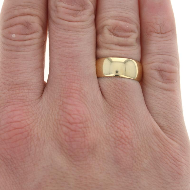 Size: 9 3/4
Sizing Fee: Down 2 sizes or up 1 size for $40

Date: 1993 (London)

Metal Content: 18k Yellow Gold

Style: Wedding Band without Stones

Measurements
Face Height (north to south): 11/32