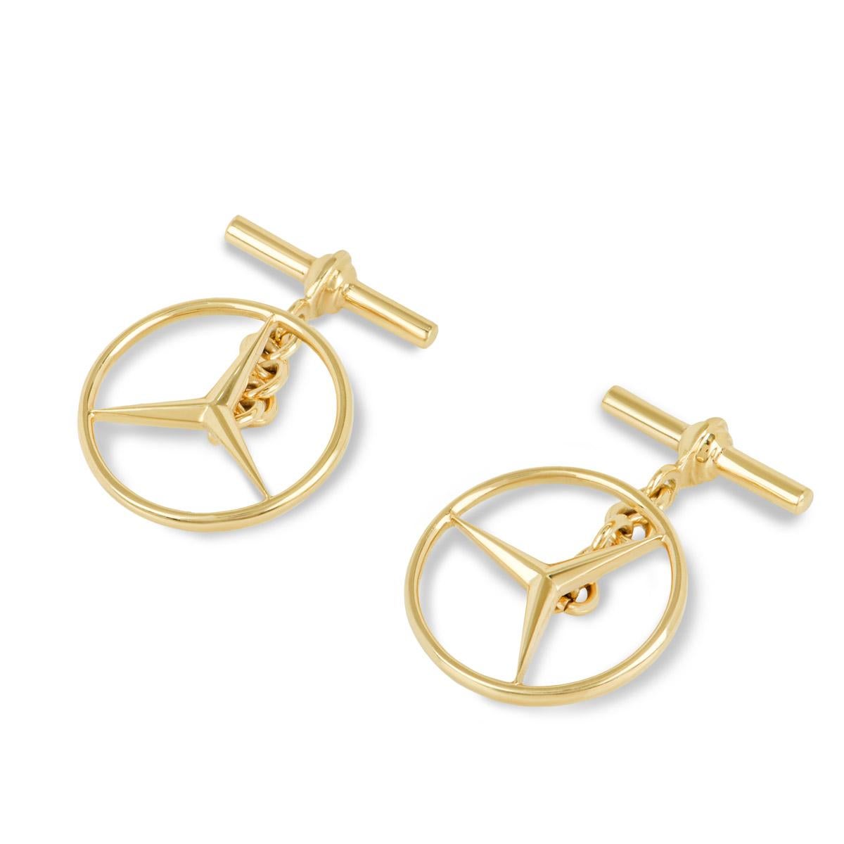 A stylish pair of 18k yellow gold cufflinks. The 2.5cm long cufflinks feature a Mercedes Benz emblem motif, finish with chain and T-bar fittings and have a gross weight of 9.62 grams.

Comes complete with a Rich Diamonds presentation box and our own