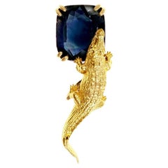 Mesopotamische Brosche aus Gelbgold mit dunkelblauem Saphir
