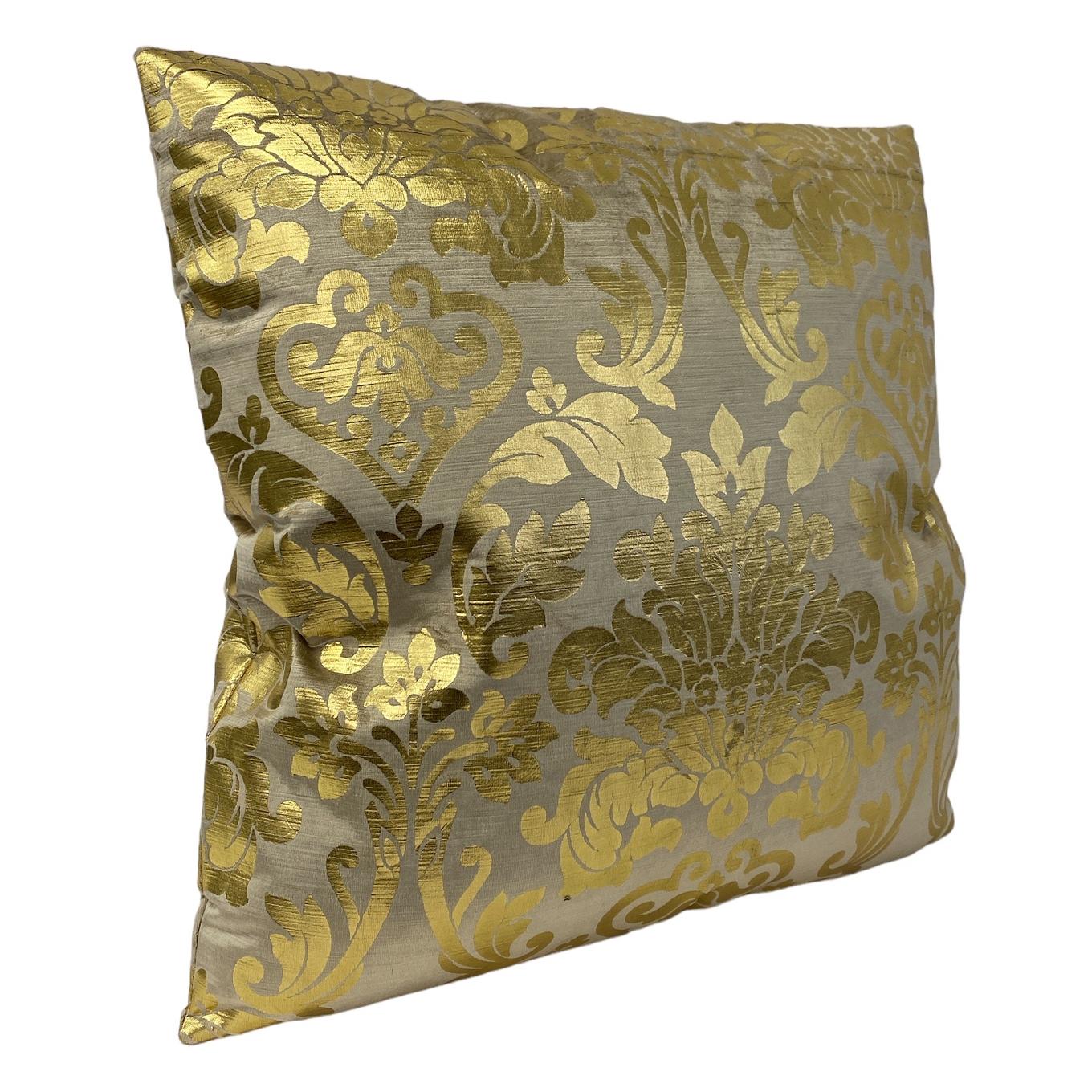 Exuberant arabesques of shimmering metallic gold seem to float above a cloud of smoky [velvet/suede].  Ethereal opulence. Makeover your couch with our plush and glamorous Yellow Gold Metallic  Velvet Pillow! Accented with a gold  print, this velvet