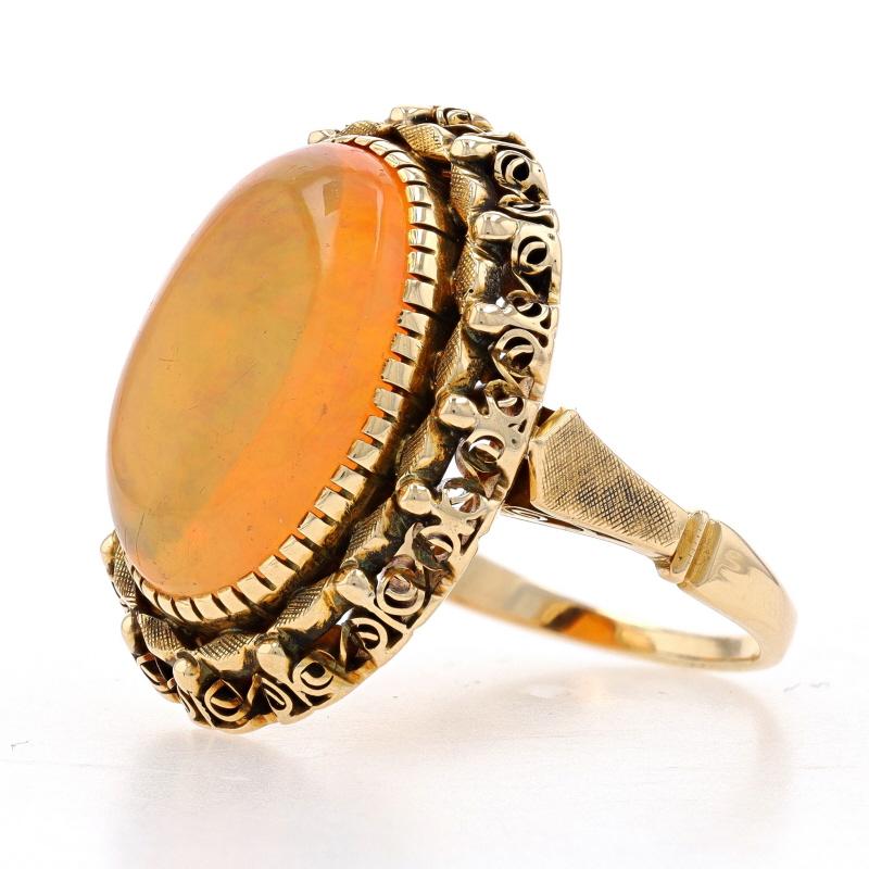 Size: 8 3/4
Sizing Fee: Up 2 sizes for $35 or Down 2 sizes for $30

Era: Retro
Date: 1950s

Metal Content: 14k Yellow Gold

Stone Information

Natural Mexican Fire Opal
Carat(s): 8.80ct
Cut: Oval Cabochon
Color: Orange

Total Carats: 8.80ct

Style: