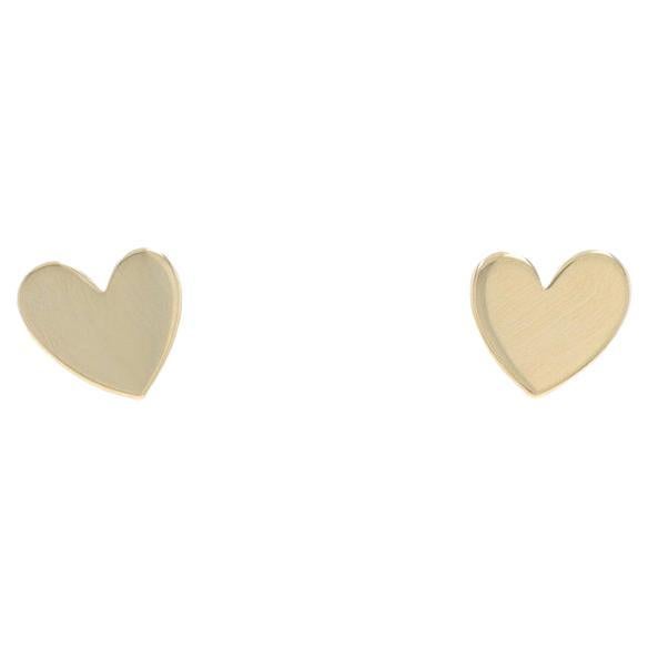 Orecchini a perno a cuore in oro giallo 14k Love Pierced