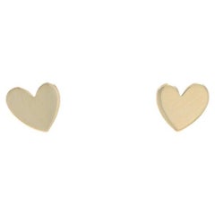 Orecchini a perno a cuore in oro giallo 14k Love Pierced