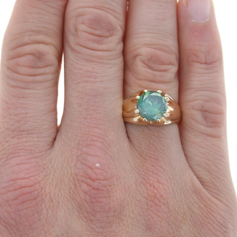 Size: 10
Sizing Fee: Down 2 sizes for $50

Metal Content: 14k Yellow Gold

Stone Information
Genuine Moissanite
Carat: 3.60ct dew
Cut: Round Brilliant 
Color: Bluish Green 
Diameter: 10.4mm

Style: Solitaire

Measurements
Face Height (north to