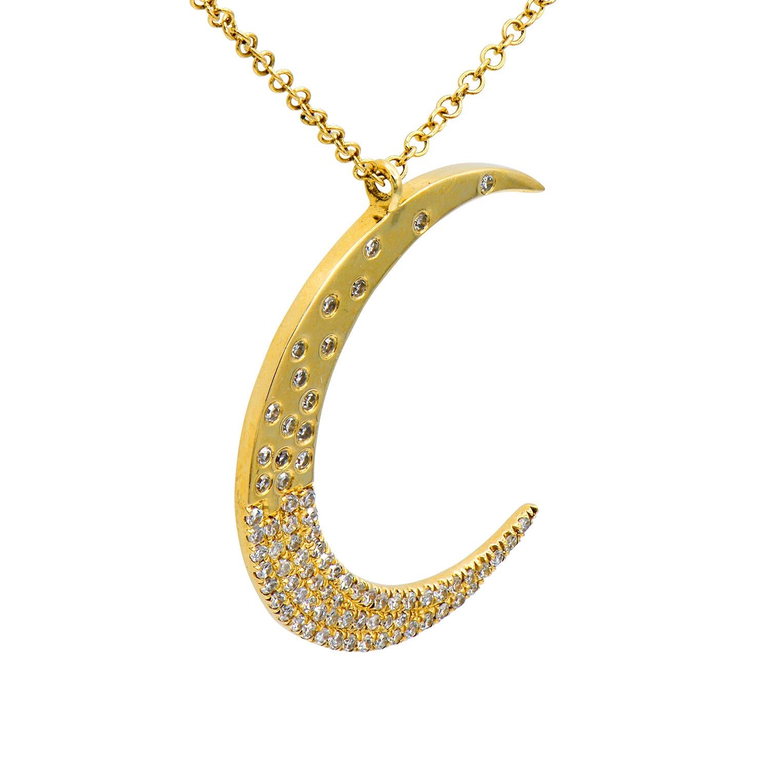 This fun moon necklace is made of 18 karat yellow gold totaling 1.8 grams. The moon is adorned with 78 round VS quality GH Color beautiful diamonds that total 0.23 carats. The diamonds are scattered on the top half of the moon and more full towards