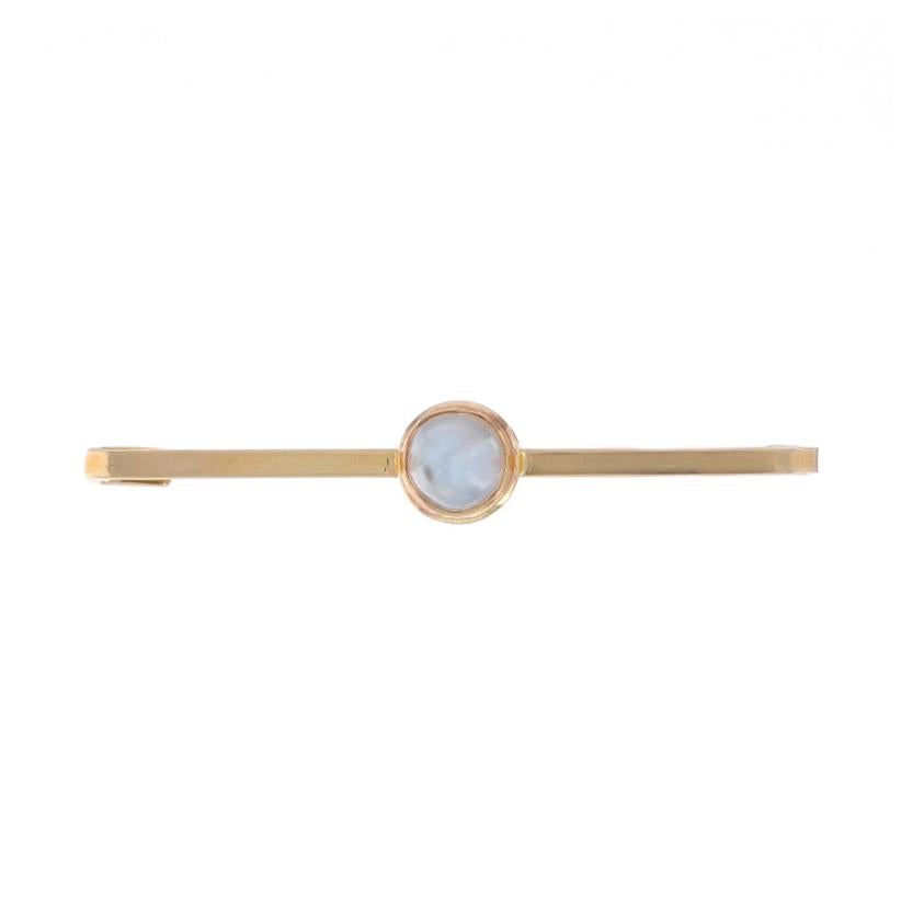 Era: Edwardian
Date: 1900s - 1910s

Metal Content: 14k Yellow Gold

Stone Information

Natural Moonstone
Carat(s): .90ct
Cut: Round Cabochon

Total Carats: .90ct

Style: Solitaire Bar Brooch
Fastening Type: Covered Pin Closure
Features: Bezel Set