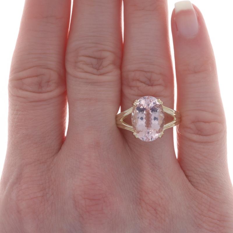 Size: 8
Sizing Fee: Up 2 sizes for $40 or Down 2 sizes for $30

Metal Content: 14k Yellow Gold

Stone Information

Natural Morganite
Carat(s): 6.75ct
Cut: Oval
Color: Light Pink

Total Carats: 6.75ct

Style: Cocktail Solitaire
Features: Split