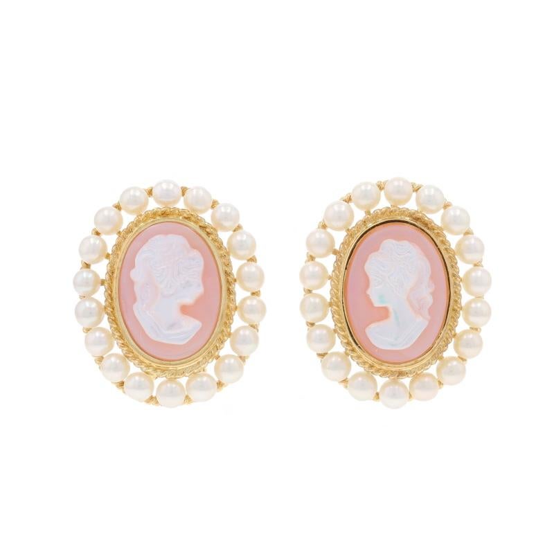 Metal Content: 14k Yellow Gold

Stone Information

Natural Mother of Pearl
Cut: Carved Cameo
Color: Pink & White
Size: 14.1mm x 10.2mm

Cultured Pearls
Color: White

Style: Large Halo Stud
Fastening Type: Omega Closures
Theme: Silhouette
Features: