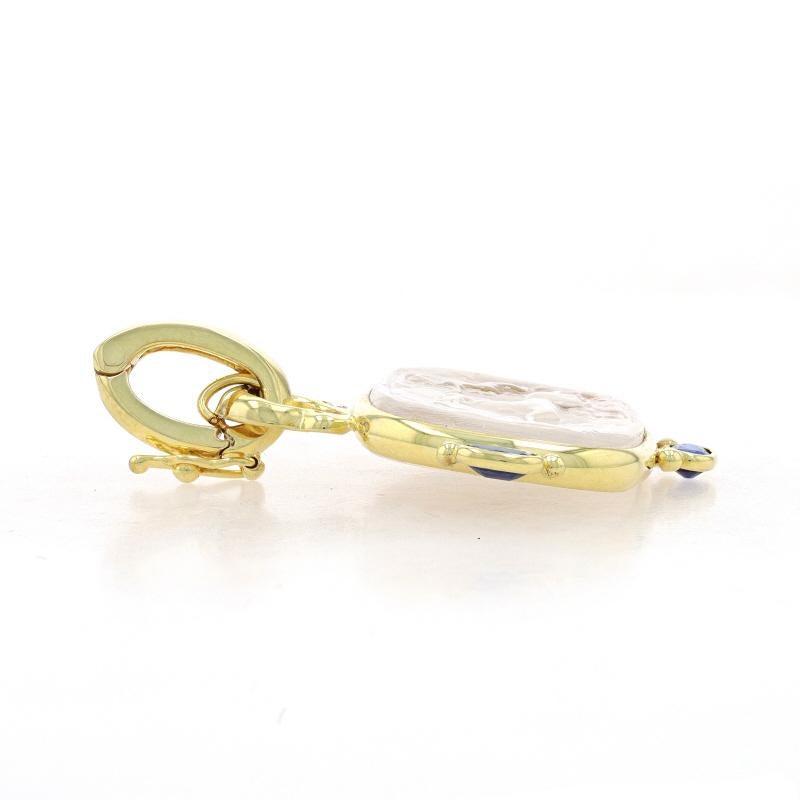 Contenido de metal: Oro amarillo de 14 quilates

Información sobre Stone
Nácar natural bajo cristal veneciano
Corte: Camafeo
Color: Blanco

Cianita natural
Talla: Oval
Color: Azul

Diamantes naturales
Quilates totales: .05ctw
Talla: Redondo
