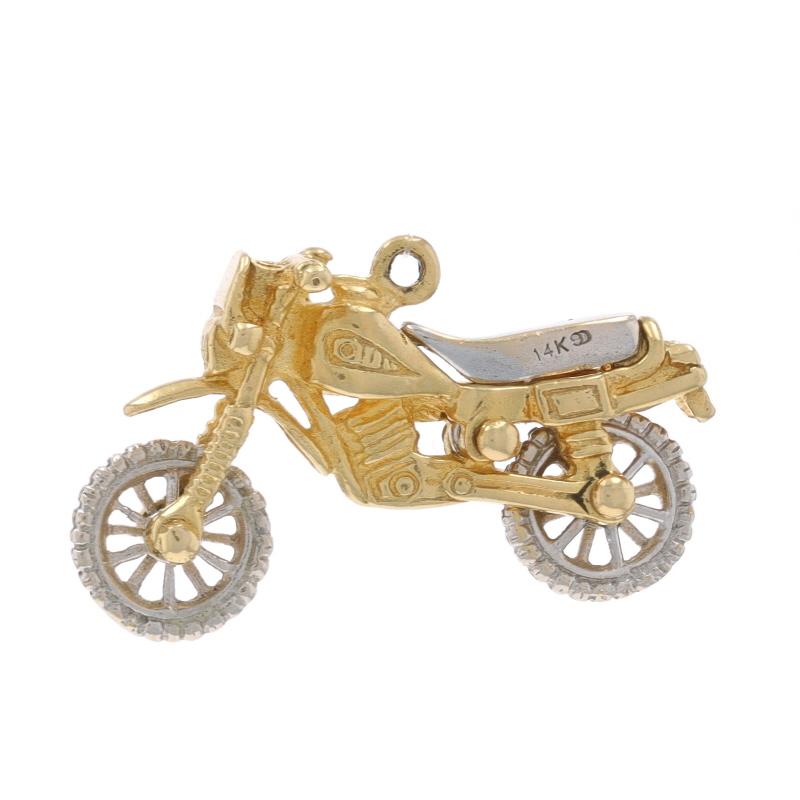 Metal Content: 14k Yellow Gold & 14k White Gold

Theme: Motorcycle
Features: Wheels Move

Measurements

Tall (from stationary bails): 9/16