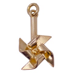 Yellow Gold Moveable Pinwheel Charm